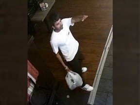 A surveillance camera image of a 'person of interest' in the fire that occurred on Erie Street South in Leamington the night of July 8, 2022. A body was found in the debris of the fire.