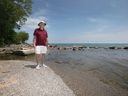 Dangerous situation. Wayne King, a member of the Leamington Shoreline Association, is shown at the Hillman Marsh Beach on July 5, 2022.