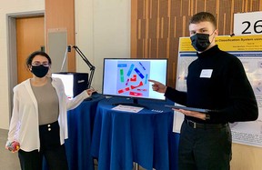 University of Windsor computer engineering students Shahed El Baba, 21, and Philip Lewoc, 22, show off the Lego recognition system they created for their capstone project - part of the exhibits at the Ed Center Lumley for Engineering Innovation on July 29, 2022.