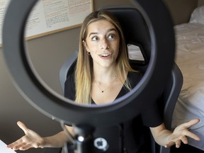 Olivia Lutfallah, 20, of Windsor, shows her setup for recording her popular TikTok videos about life with ADHD. Photographed June 30, 2022.