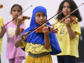 Sound of music. After three weeks of summer practice with Windsor Symphony Orchestra professionals, youngsters showed off their violin skills at a performance of "The String Project" for parents and guests at Frank W. Begley Public School on July 22, 2022.