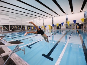 Jai Shergill is shown Friday, July 8, 2022, diving into the pool at the University of Windsor's new state-of-the-art Toldo Lancer Centre which opened this week.