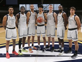 New University of Windsor mens basketball recruits from left, Najee Brown-Henderson, Yohann-Axel Sam, Isaiah Scipio, Jomel Puno, Andrew Brayall, Daniel Cummings and Quinn Carey.