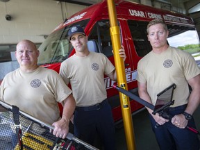 Windsor firefighters from Station 4, from left, Steve Grona, Byran Beneteau, and Patrick Clair, who are part of the Windsor Fire and Rescue urban search and rescue team are pictured on Tuesday, July 5, 2022.