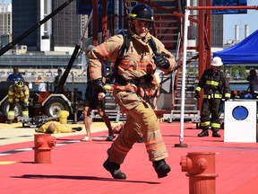 Firefighters competed Saturday, July 30, 2022, in the FireFit obstacle course that included a stair climb, forcible entry simulation, sprints, and a victim rescue with a 175-pound mannequin dragged 100 feet. The challenge was part of the Can-Am Police Fire Games.