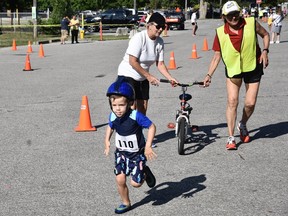 Heading to the finish. More than 260 kids competed in the annual Pure Kids WFCU Triathlon at Tecumseh's Lacasse Park on Saturday, July 30, 2022. The race, consisting of a swim, bike ride and finishing with a run, drew competitors aged three to 13.
