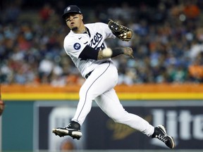 Shortstop Javier Baez of the Detroit Tigers throws out Jose Rojas of the Los Angeles Angels at first base on a grounder during the eighth inning at Comerica Park on August 19, 2022, in Detroit, Michigan.