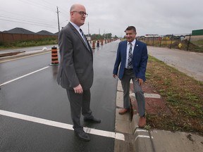 Windsor Mayor Drew Dilkens, left, and Coun. Jeewen Gill are shown along Banwell Road on Monday, August 8, 2022 at a press conference regarding improvements to the corridor.