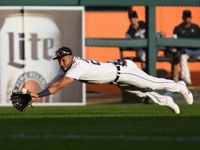 Detroit Tigers left fielder Victor Reyes is unable to make a diving catch on a single hit by San Francisco Giants designated hitter Tommy La Stella (not pictured) during the first inning at Comerica Park.