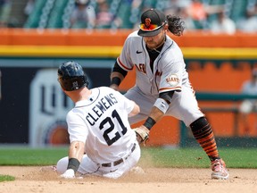 Detroit Tigers first baseman Kody Clemens slides in safe at second ahead of the tag by San Francisco Giants shortstop Brandon Crawford in the fourth inning at Comerica Park.