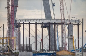 Gordie Howe bridge project struggles to finish on time Struts that will eventually form the road section of the Gordie Howe International Bridge will be displayed Thursday on the Canadian side of the new border span under construction.