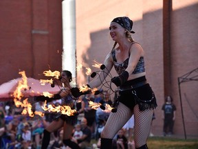 The NorthFIRE Circus performs at Busk On the Block in Windsor's Walkerville area on Aug. 6, 2022.