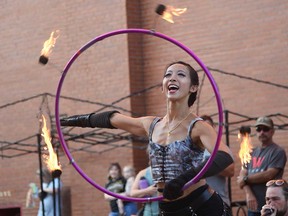 The NorthFIRE Circus performs at Busk On the Block in Windsor's Walkerville area on Aug. 6, 2022.