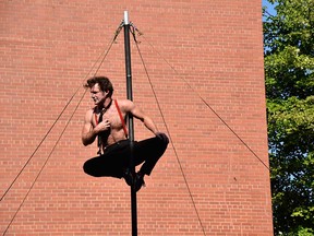 Busker Derek Derek performs at Busk On the Block in Windsor's Walkerville area on Aug. 6, 2022.