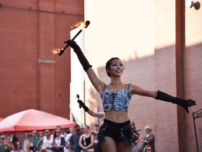 The NorthFIRE Circus performs at Busk On the Block in Windsor's Walkerville area on Aug. 6, 2022.