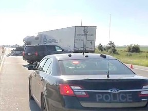 One of the collision scenes involving a transport truck in the eastbound lanes of Highway 401 in the Lakeshore area on the morning of Aug. 18, 2022.