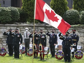 WINDSOR, ONTARIO. AUGUST 19, 2021 -  Dignitaries are shown on Thursday, August 19, 2021 at the Dieppe Park in downtown Windsor during a ceremony marking the 79th anniversary of the disastrous Dieppe Raid.