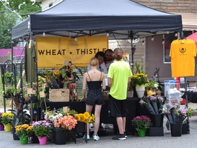 Vendors set up booths along Drouillard Road Saturday, Aug. 20, 2022, at the Ford City BIA Dropped on Drouillard urban street and culture festival.