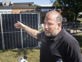 Andrew Knapp, managing director of Moose Power, a Toronto-based company that builds, owns, and operates solar, energy storage and micro-grid projects, speaks during a press conference outside the Constable John Atkinson Memorial Community Centre on renewable energy infrastructure, on Tuesday, August 2, 2022.