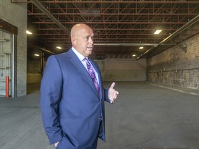 Brook Handysides, from CBRE, is pictured in a newly leased industrial site on County Road 42, on Wednesday, August 17, 2022.