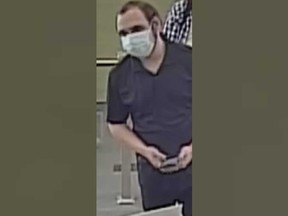 A surveillance camera image of the suspect in the case of a Lakeshore resident whose identity was stolen to commit fraud on May 31, 2022.
