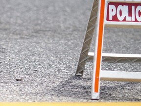 A bullet casing lays on the road after a machete-wielding man was shot by a Windsor police officer, at the intersection of Wyandotte Street and Ouellette Avenue, on Monday, August 15, 2022.