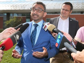 Good for business, good for the climate.  Federal Minister of Transport Omar Alghabra, left, and MP Irek Kusmierczyk (L — Windsor-Tecumseh) are shown during a press conference on Tuesday, Aug. 30, 2022, at Windsor's VIA Rail station.