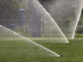 Sprinklers operate on a sports field in Windsor in this 2007 file photo.