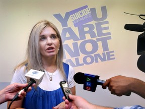 Kim Willis, director of communications and mental health promotion for Canadian Mental Health Association - Windsor Essex County branch speaks at a press conference on Thursday, August 25, 2022 regarding suicide awareness month.