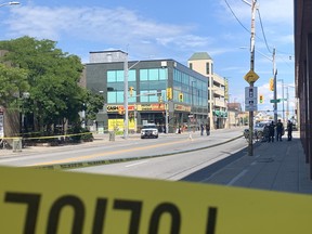 The scene of Wyandotte Street and Ouellette Avenue where a Windsor police officer shot a suspect during a weapons call is seen on Monday, Aug. 15, 2022.