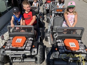 Jaxson, Cole and Katelynn Hurst (from left) are seen at the Safety Village first Community Safety Day on Saturday, Aug. 27, 2022.