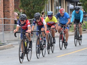 Tour di Via Italia cyclists race along the streets of Windsor's Little Italy Saturday, Aug. 13, 2022.