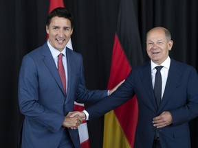 Prime Minister Justin Trudeau greets German Chancellor Olaf Scholz in Montreal, Monday, Aug. 22, 2022.