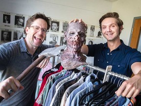 Director Mike Stasko (left) and writer/producer Jakob Skrzypa (right) show a prop from their current movie project Vampire Zombies... From Space! Photographed in Windsor on Aug. 3, 2022.