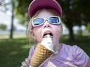 In this July 2020 file photo, 4-year-old Kira Drayton beats the heat with ice cream at Learm Park in Windsor.