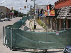 A fenced in sidewalk near last year's explosion in downtown Wheatley is shown on Friday, August 26, 2022.