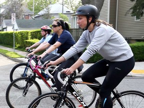 A trio of Windsor cyclists is shown in this May 2019 file photo.