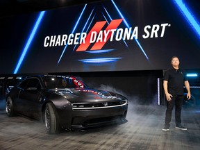 Tim Kuniskis, CEO of Dodge Brand, Stellantis, introduces the Dodge Charger Daytona SRT Concept all-electric muscle car at its world reveal during Dodge's Speed Week at M1 Concourse on August 17, 2022 in Pontiac, Michigan. A production electric vehicle from Dodge is expected to launch in 2024.