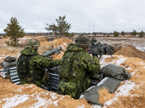 Members of Canadian army during Crystal Arrow 2022 exercise  on March 7, 2022 in Adazi, Latvia. Approximately 2,800 soldiers from Albania, Canada, Czech Republic, Italy, Iceland, Montenegro, Poland, Slovakia, Slovenia, Spain, Latvia and the United States of America train for interoperability during tactical military operations, including the demonstration of winter capability."r