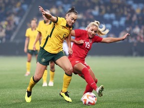 Caitlin Foord of the Matildas is challenged by Adriana Leon of Canada during the International Friendly Match between the Australia Matildas and Canada at Allianz Stadium on September 06, 2022 in Sydney, Australia.