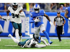 Detroit Lions' running back D'Andre Swift  looks for a hole during Sunday's game against the Philadelphia Eagles at Ford Field.
