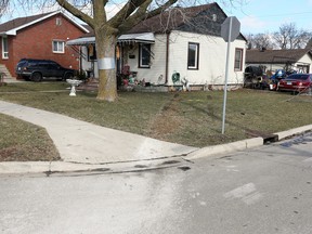Faint tire tracks can be seen on the front yard of this home in the 1500 block of George Avenue on Feb. 15, 2019, the day after a Cadillac slammed into another vehicle, leading to the death of Karen Kelly, 69.