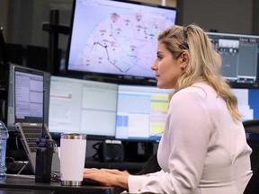 Erica Nohra, a 911 communicator, at work in the Emergency 911 Centre housed in Windsor Police Service headquarters. Photographed Sept. 13, 2022.