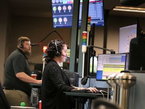 A 911 communicator at the Emergency 911 Center at Windsor Police Headquarters.  Taken September 13, 2022.