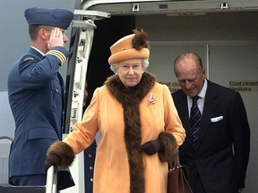 Queen Elizabeth II and Prince Philip arrive in Regina during a visit to Canada to commemorate the centennial of Saskatchewan and Alberta's entry into Confederation, May 17, 2005.