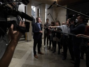 Conservative MP for Leeds-Grenville-Thousand Islands and Rideau Lakes Michael Barrett speaks with media before attending caucus, in Ottawa, Wednesday, Sept. 21, 2022.