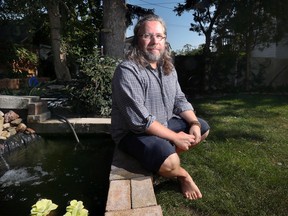 Writer DA Lockhart screens Wednesday at his home in Windsor.