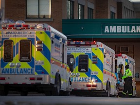 Ambulances are seen lined up outside the Emergency Department at Windsor Regional Hospital's Met campus, on Jan. 7, 2022.