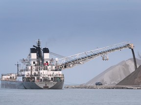 A Great Lakes bulk carrier unloads aggregate at the Port of Windsor on Dec. 4, 2020.