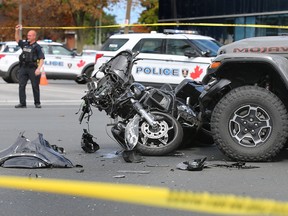 A Windsor Police officer is shown at the scene of an accident involving a motorcycle at the intersection of Tecumseh and Drouillard on Thursday, September 22, 2022.